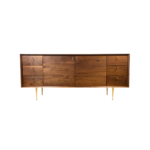 Ohio 1 sideboard made with solid American
  walnut and parallel brass legs – side view