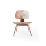 Ranchwood 1 lounge chair made with
  American walnut plywood frame and plywood cow skin seat – main view
