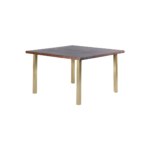 Riba 1 dining table made with solid
  American walnut top and brass tube legs – main view