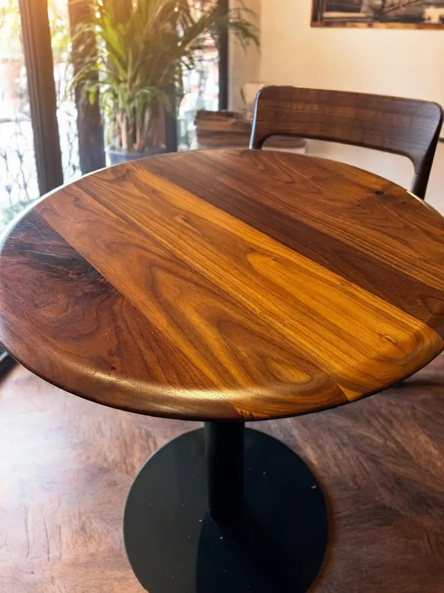 cafe furniture NYC solid walnut dining table brass base restaurant interior