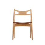 Helix 1 dining chair made with premium
  brown leather seat and whiteoak wood legs and plwyood backrest – main view
