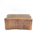 Khepri 1 side table made with hand-forged
  bronze patina finish and hand-forged bronze patina finish – side view
