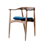 Mason 1 dining chair made with premium
  blue fabric upholstery and solid American walnut legs – main view