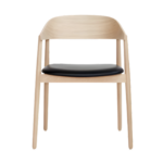 Nordby 1 dining chair made with premium
  black leather seat and solid American whiteoak frame and plywood backrest –
  main view