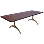 Sierra 1 dining table made with solid
  American walnut live-edge top and cast brass y shape legs – main view