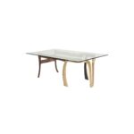 Torsion 1 dining table made with tempered
  glass top and solid American walnut and brass base – main view