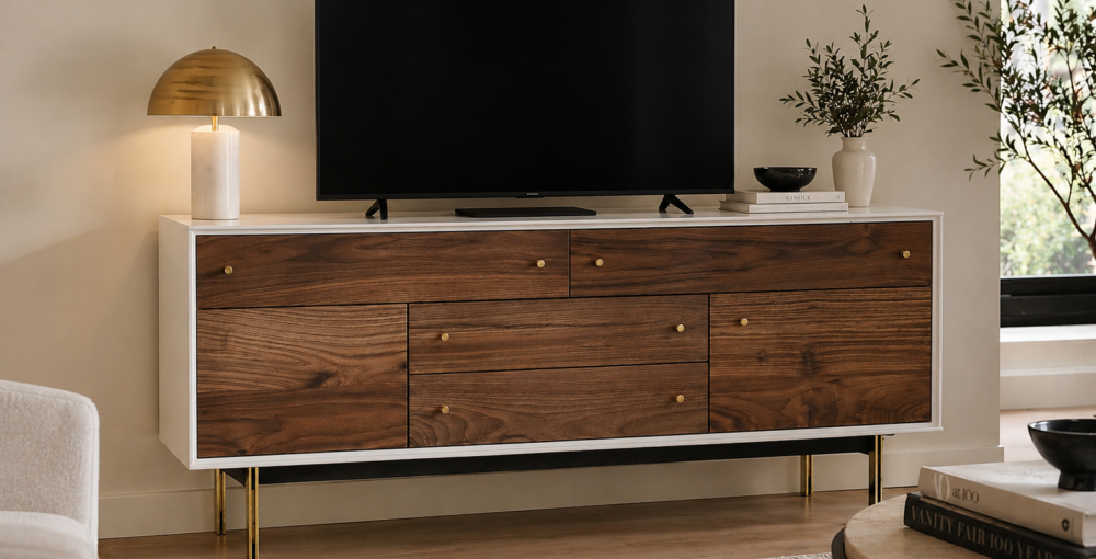 Mid-century walnut media console with TV and brass accents in modern living room
